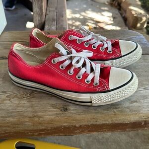 Converse, woman’s size 7 red.
